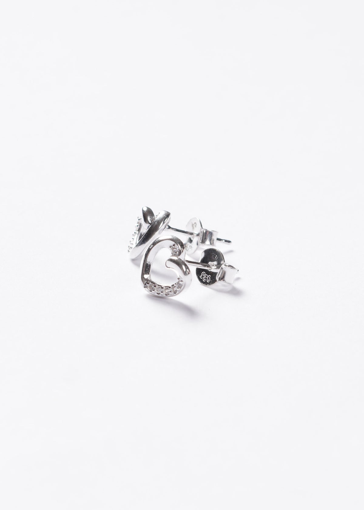 Caravanas corazón mitad zirconias Plata 925
