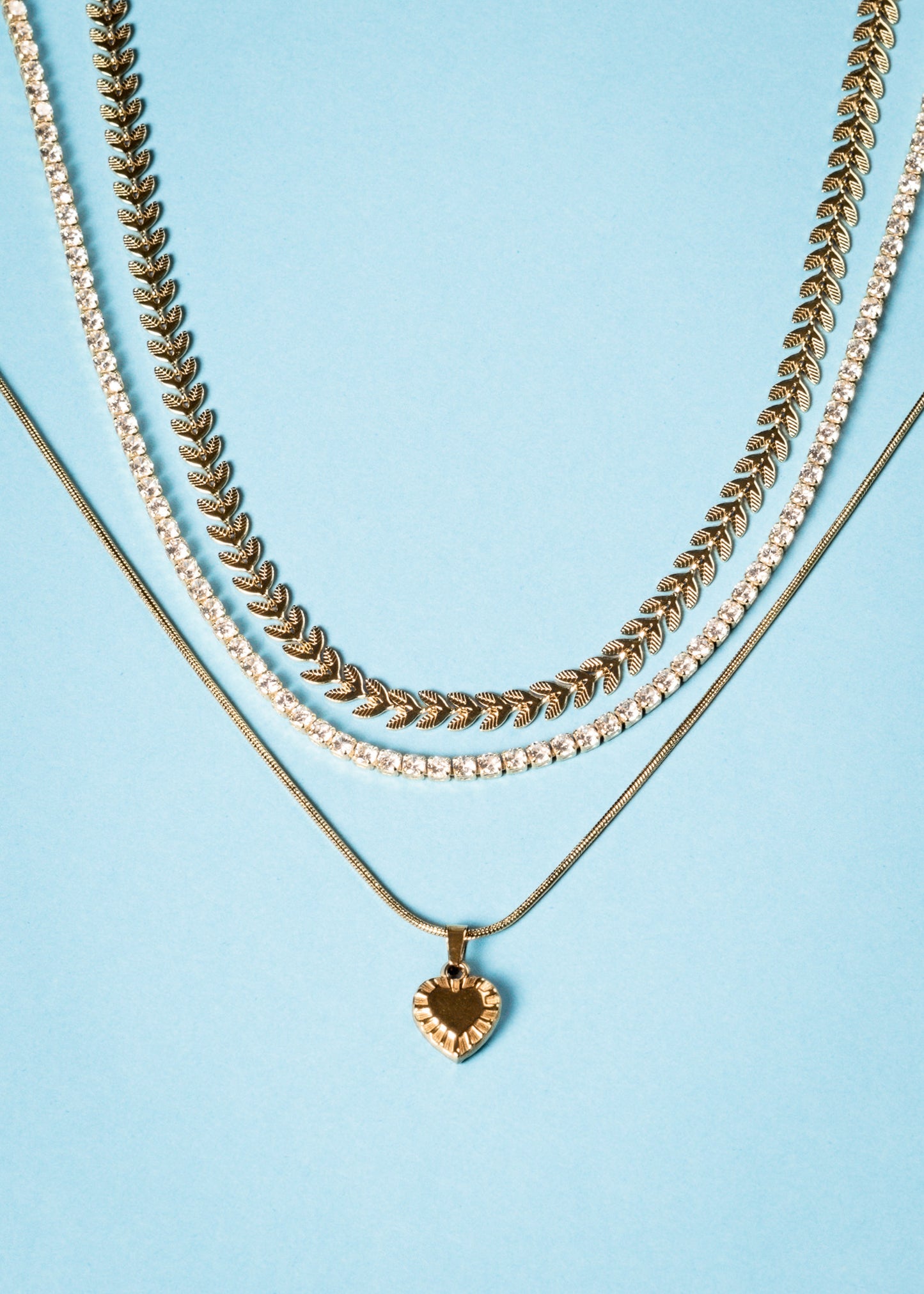 Dije corazón facetado acero quirúrgico dorado