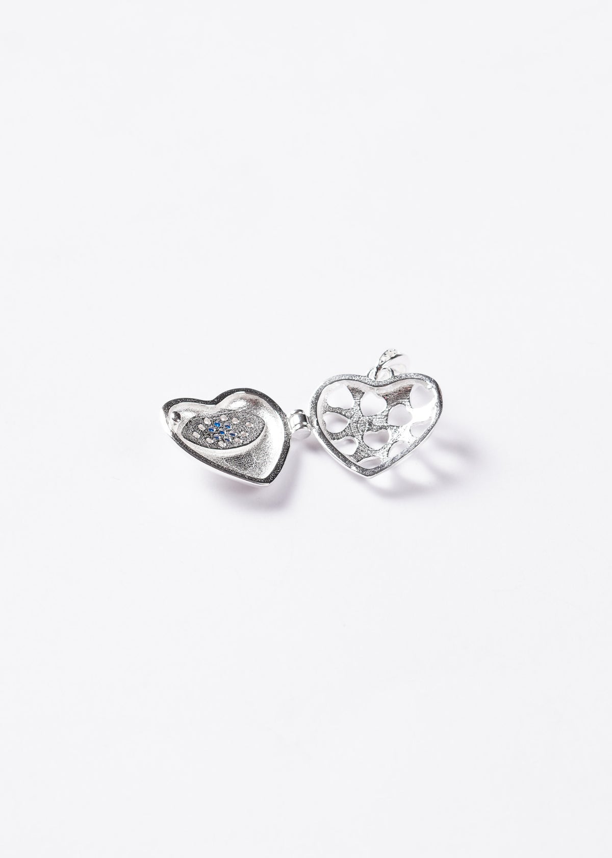 Dije relicario corazón zirconias blancas y azules Plata 925