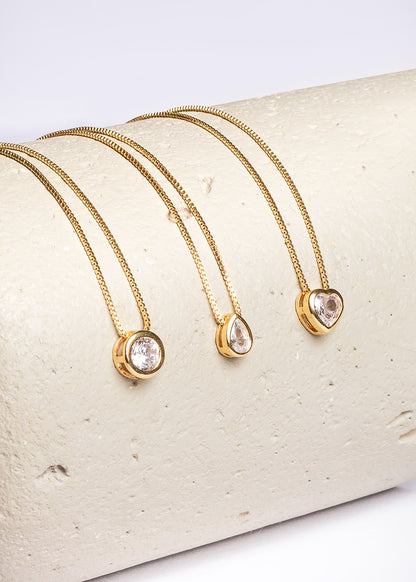 Cadena collar con dije punto luz zirconia baño en oro 18k