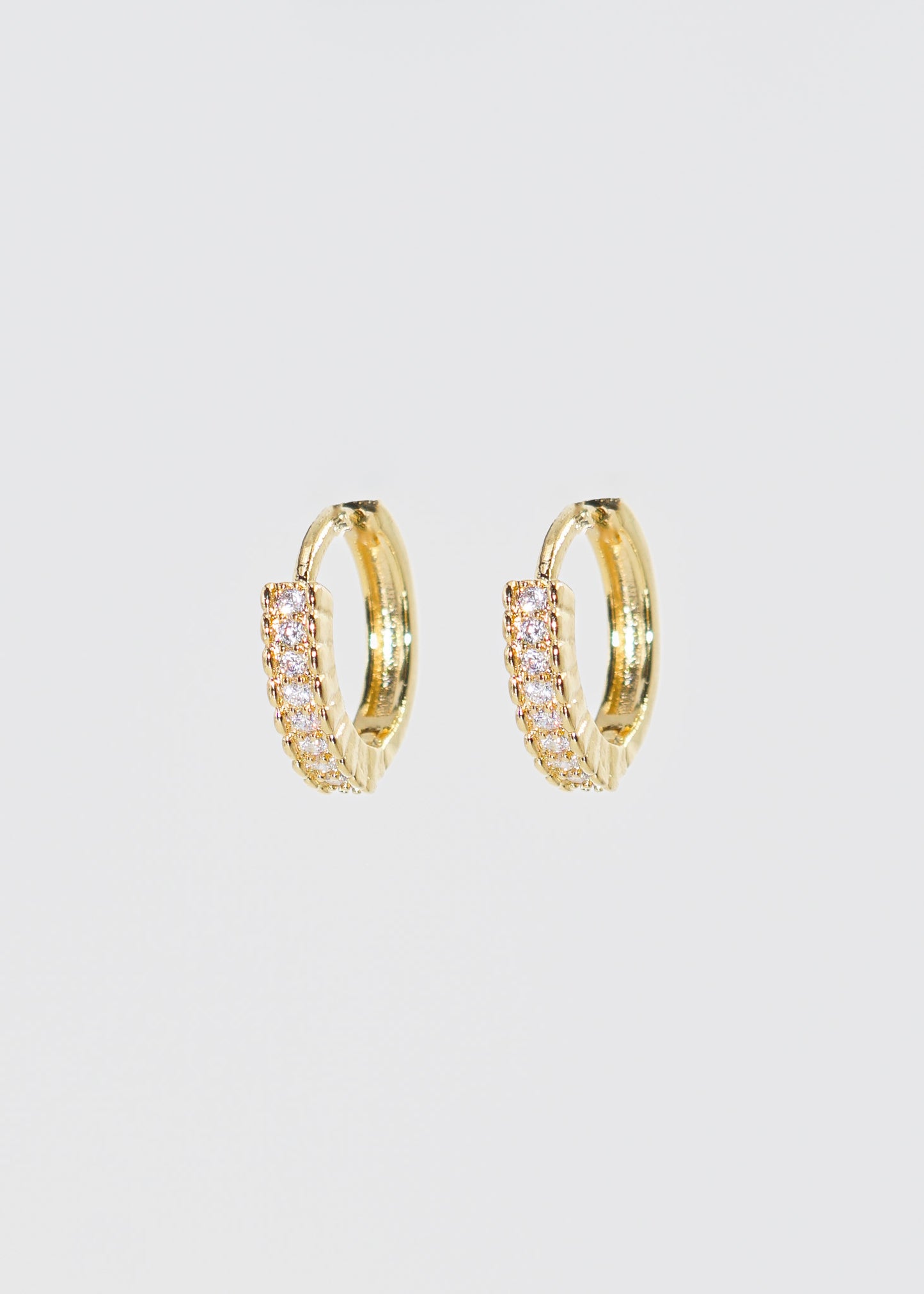 Caravanas aros con zirconia baño en oro 18k