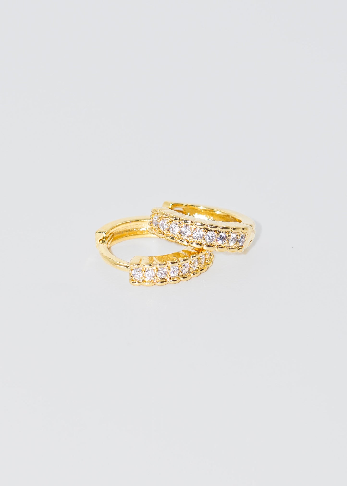 Caravanas aros con zirconia baño en oro 18k