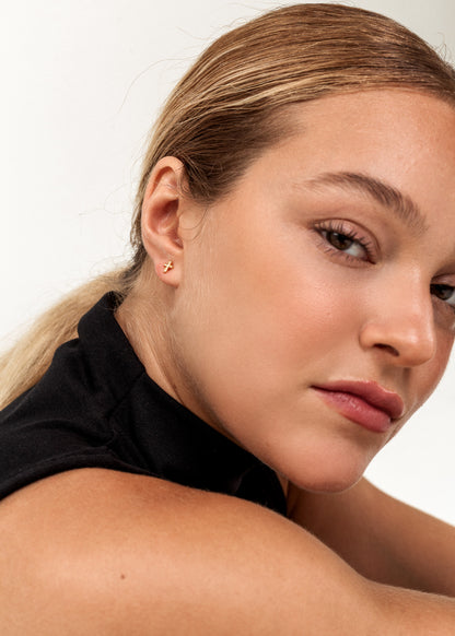 Caravanas cruz mini baño en oro 18k