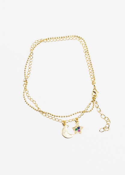 Pulsera doble dije luna y estrella zirconias baño en oro 18k