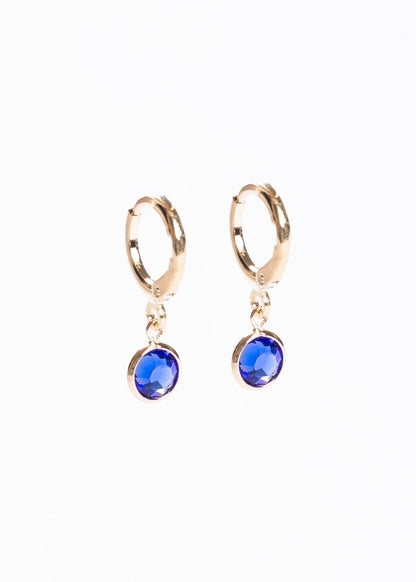 Caravanas aros con dije punto luz azul baño en oro 18k