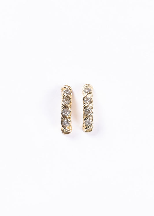 Caravanas medio aro entrelazado con zirconias baño en oro 18k