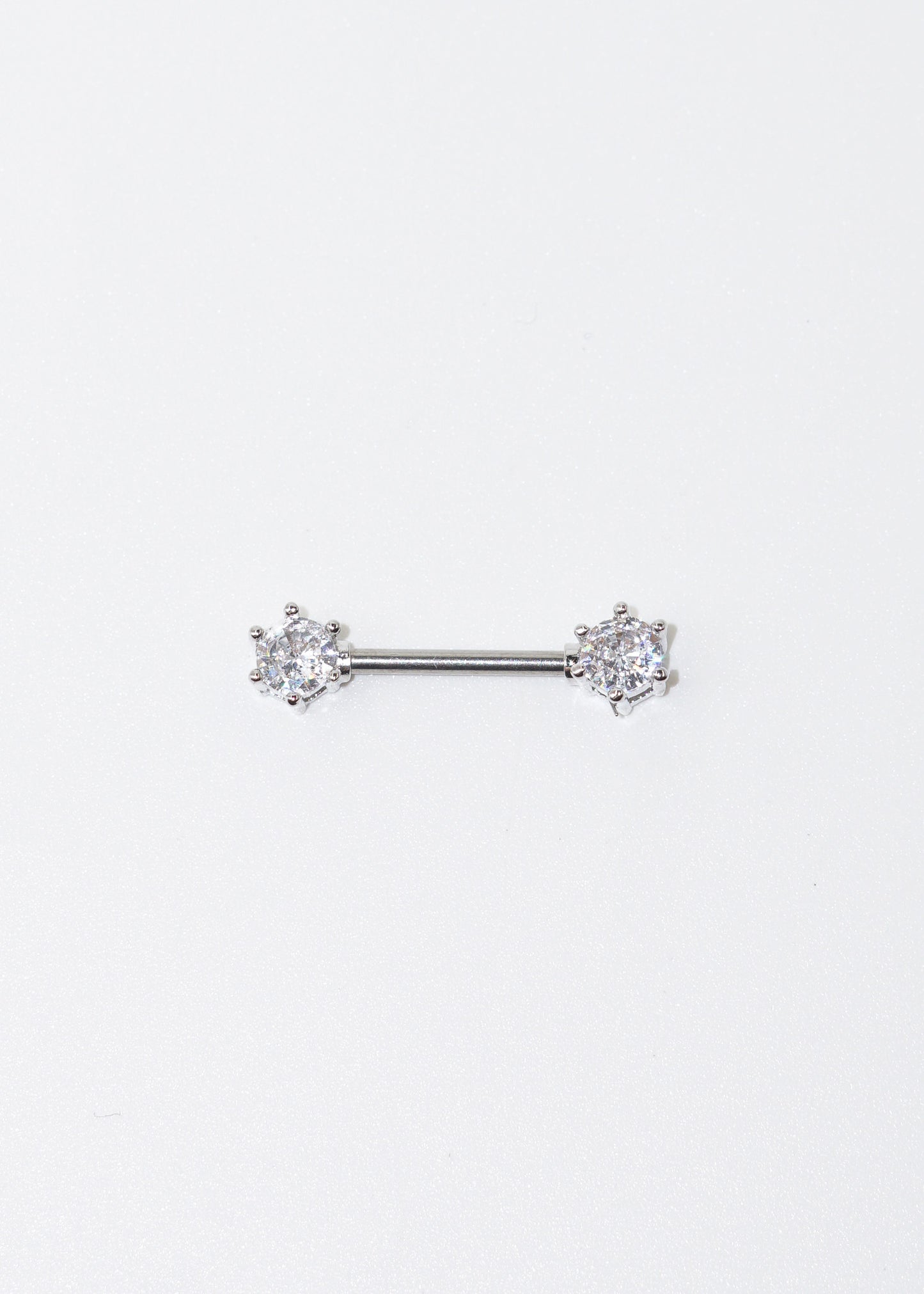 Piercing barra con zirconias para pezón acero quirúrgico