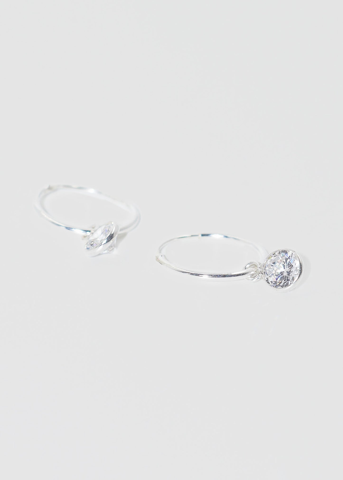Caravanas aros con dije punto luz zirconia plata 925