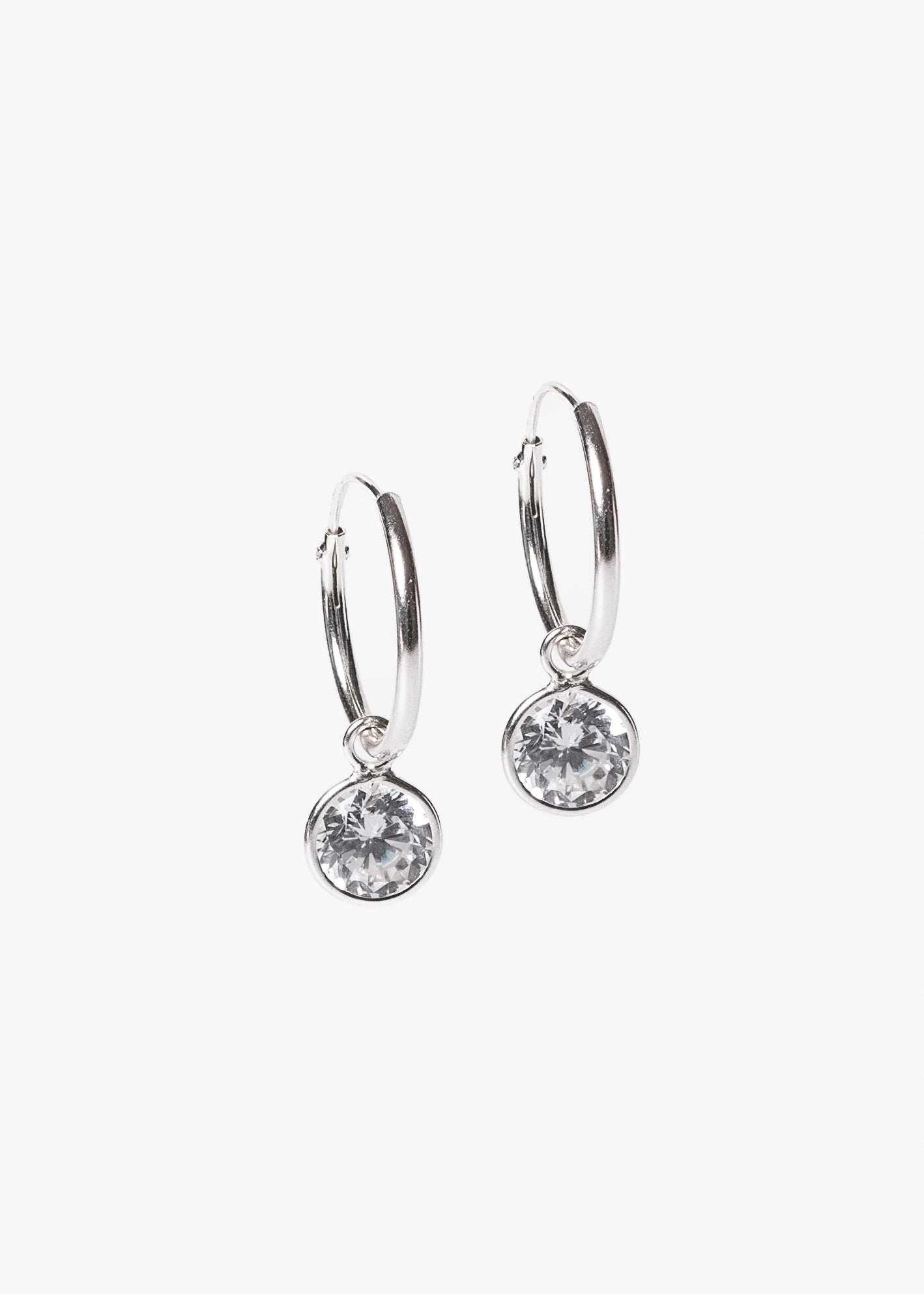 Caravanas aros con dije punto luz zirconia plata 925