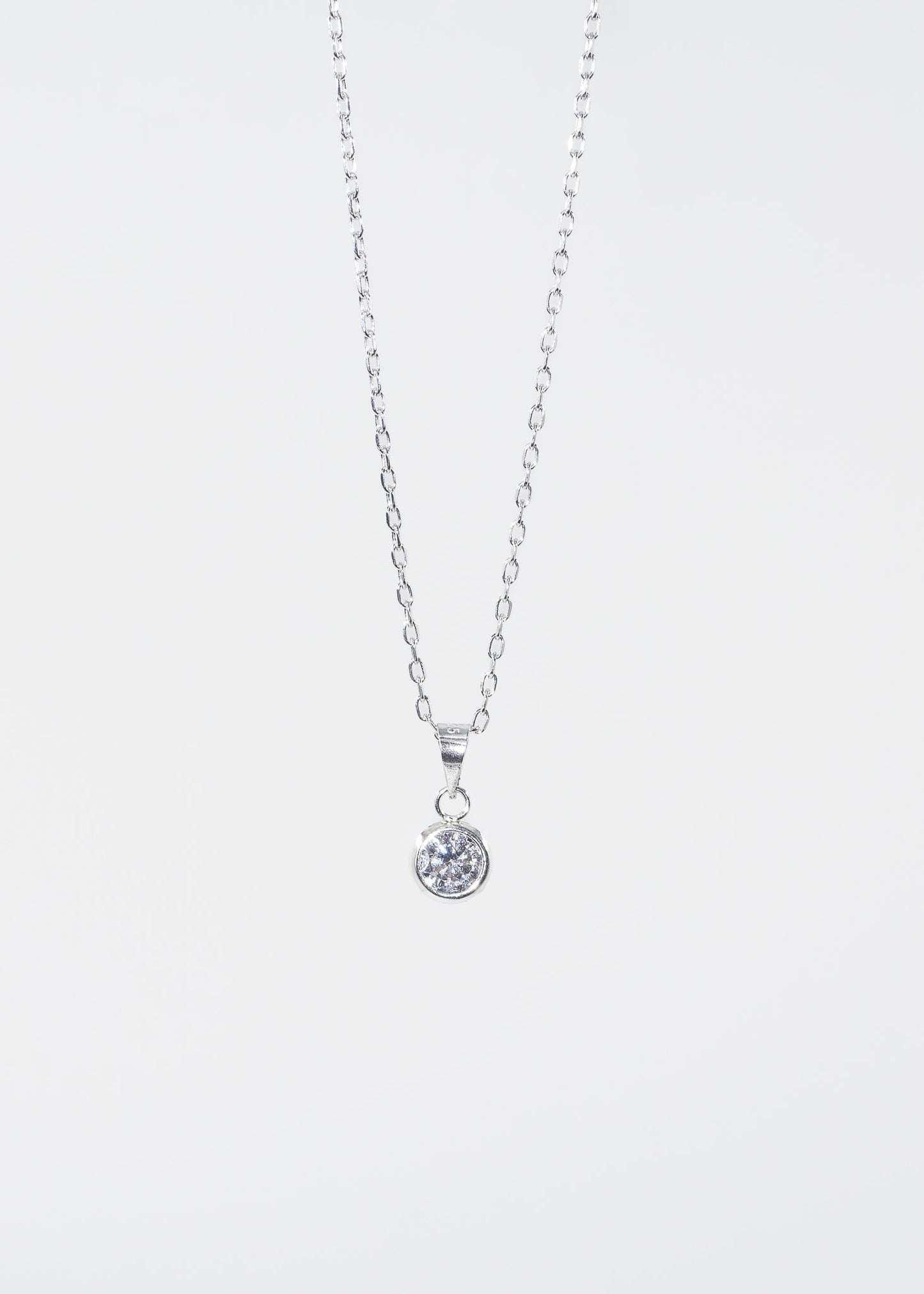 Cadena collar forcet con dije punto luz zirconia plata 925