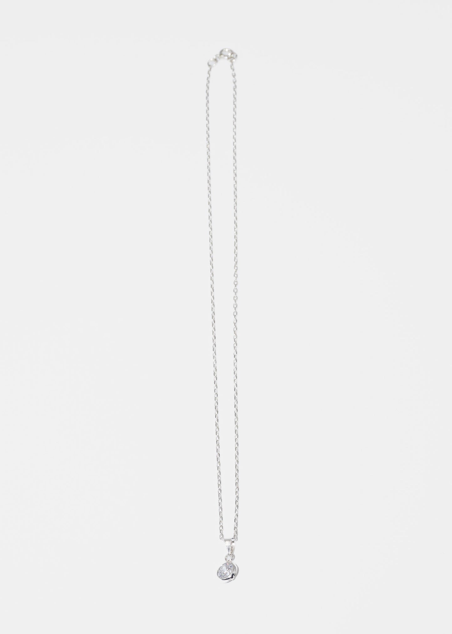 Cadena collar forcet con dije punto luz zirconia plata 925