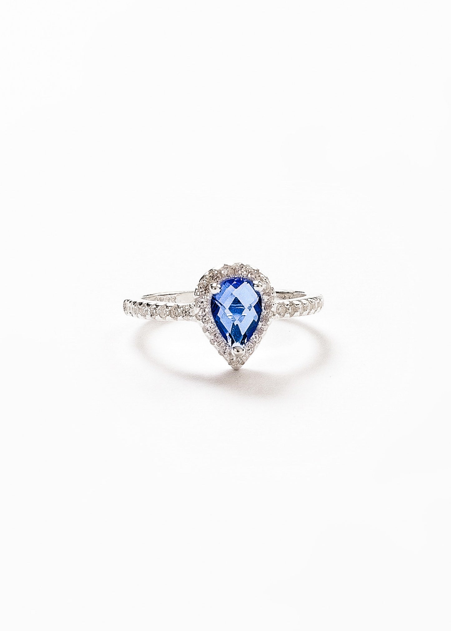 Anillo gota azul zirconias laterales plata 925
