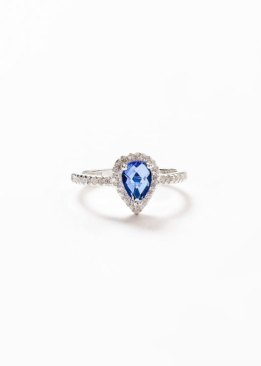 Anillo gota azul zirconias laterales plata 925
