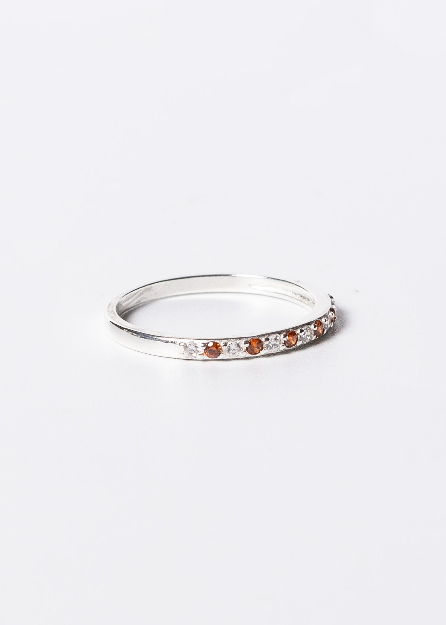 Anillo sin fin zirconias blancas y naranjas plata 925