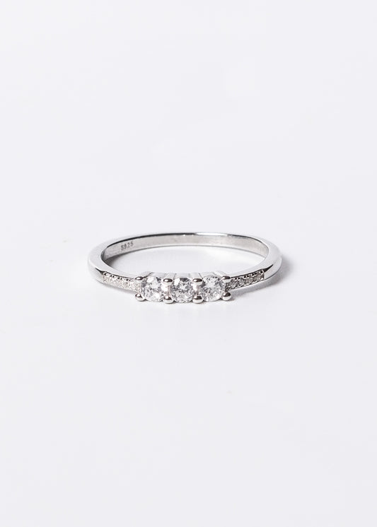 Anillo puntos luz y zirconias laterales plata 925