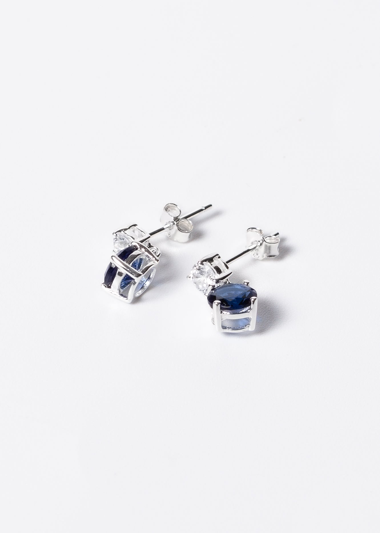 Caravanas punto luz zirconia azul plata 925