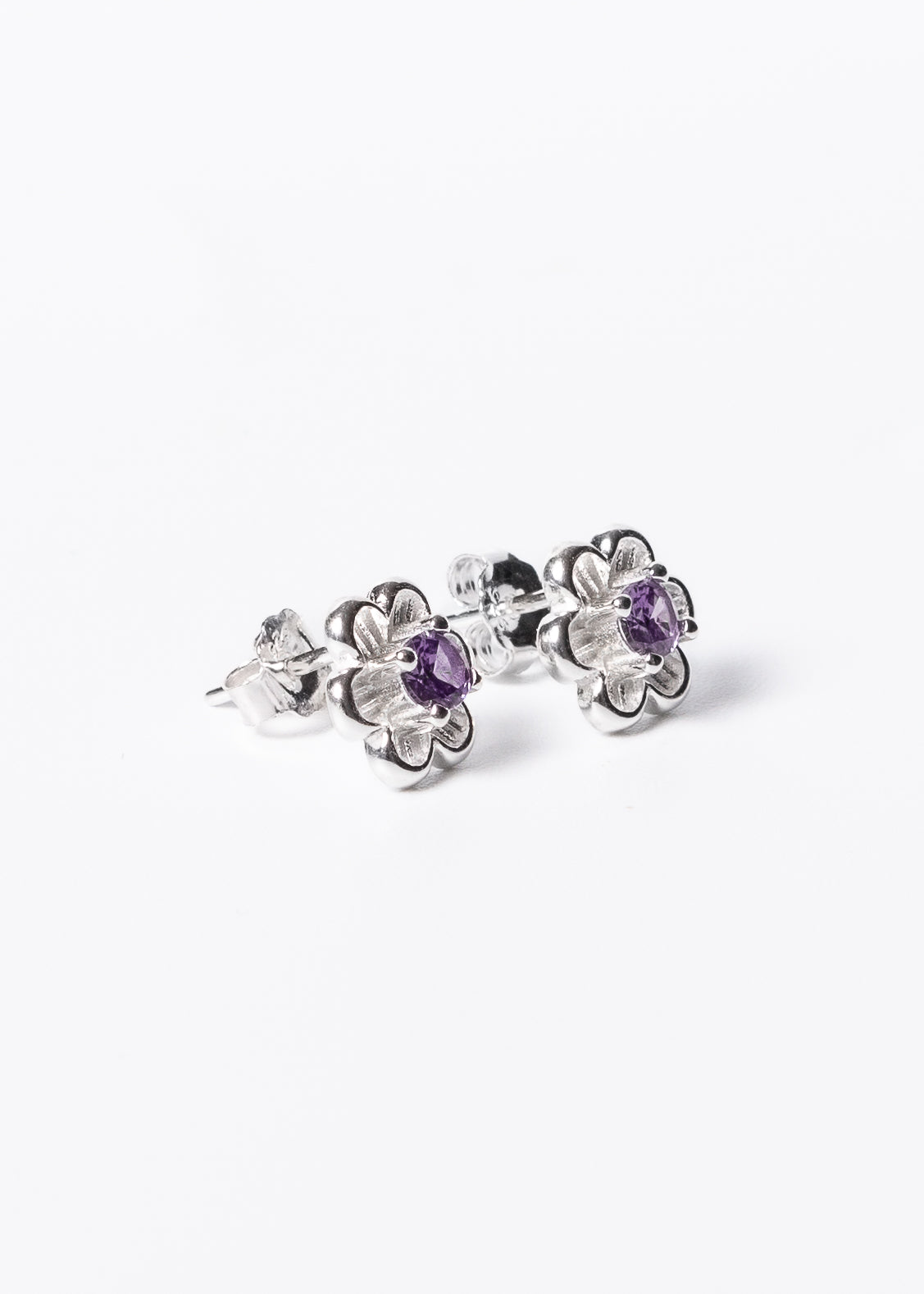 Caravanas flor zirconia violeta plata 925