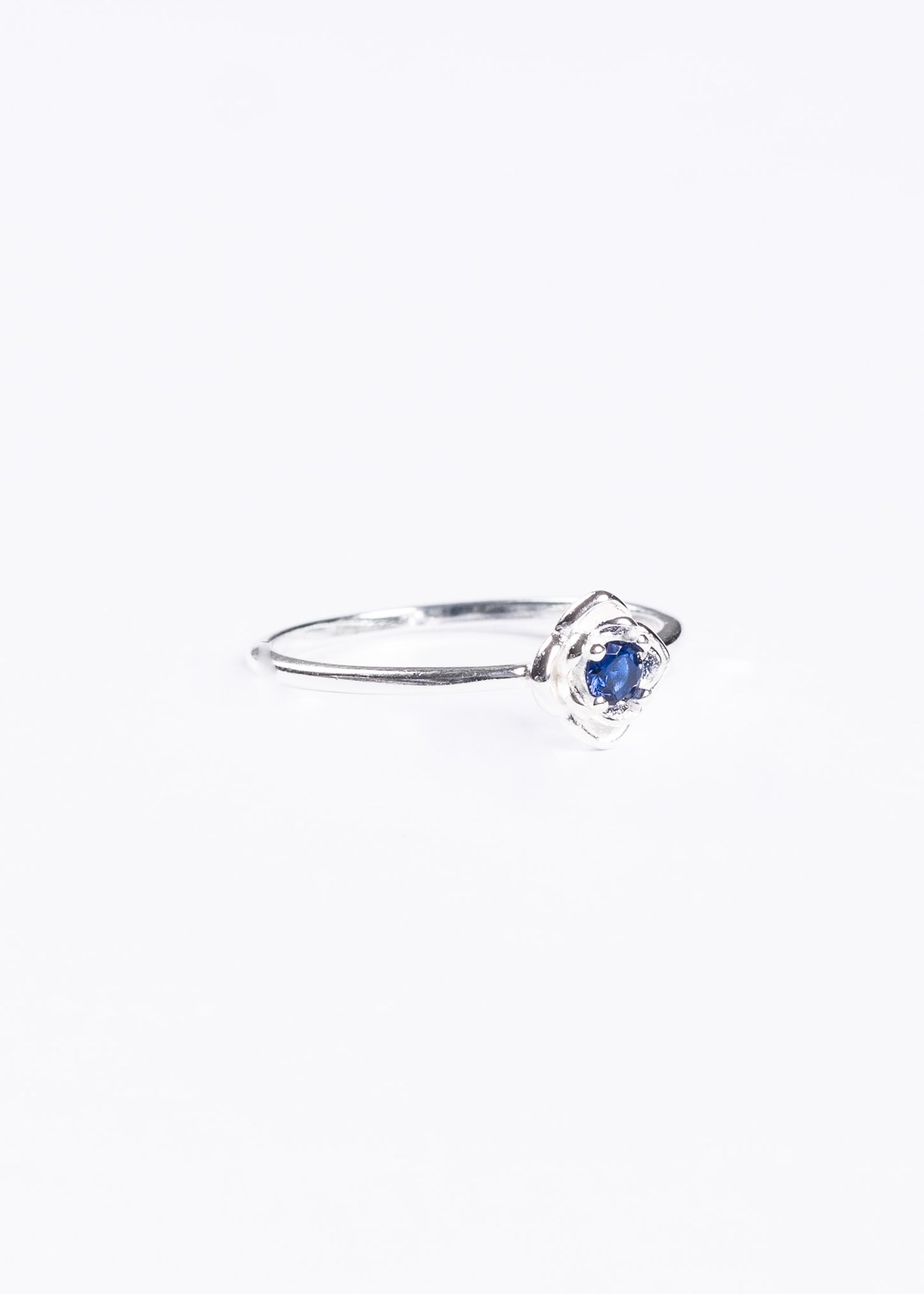 Anillo flor zirconia azul plata 925