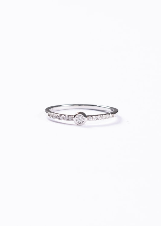 Anillo punto luz con zirconias laterales plata 925