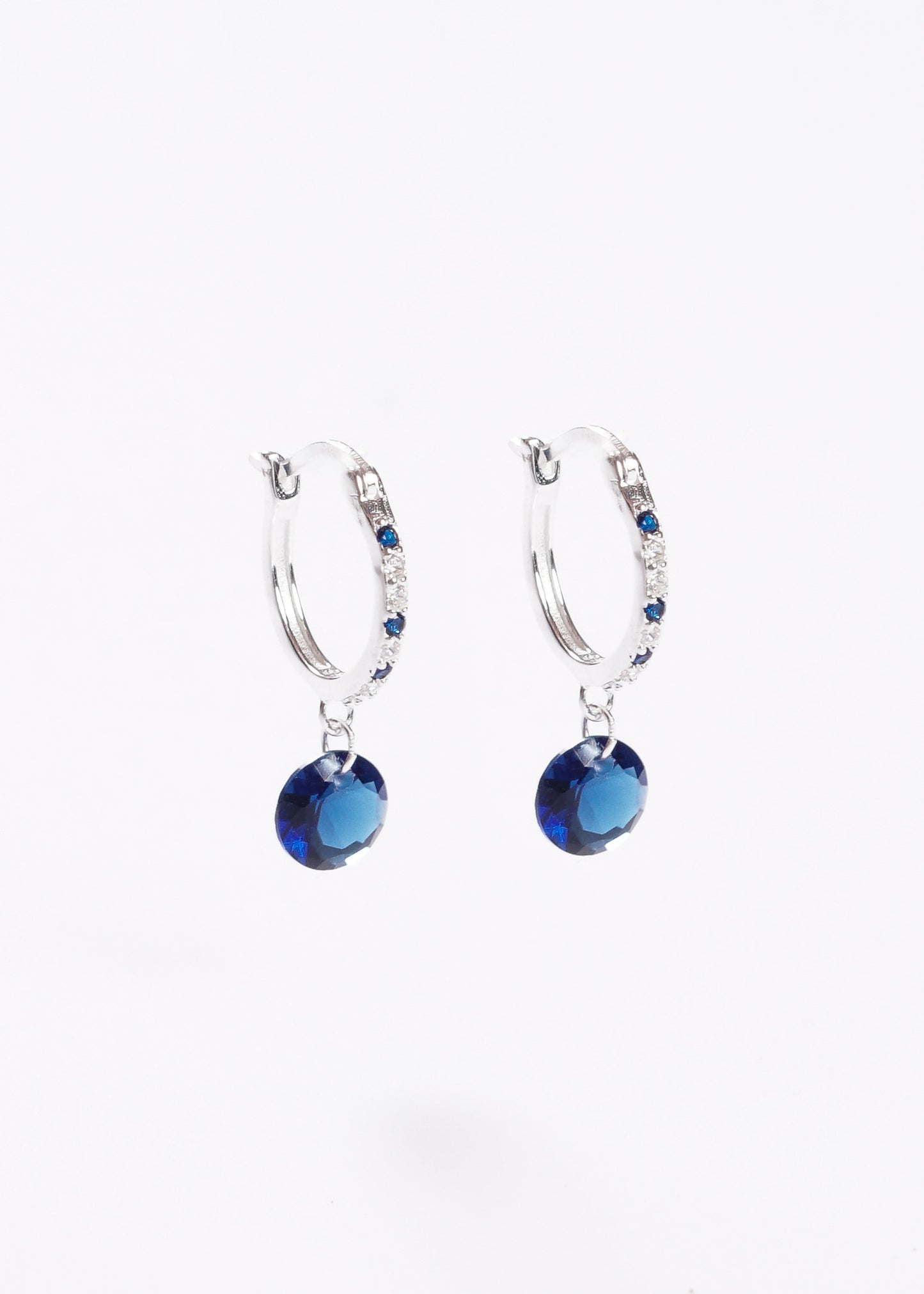 Caravanas aros zirconias con punto luz azul plata 925