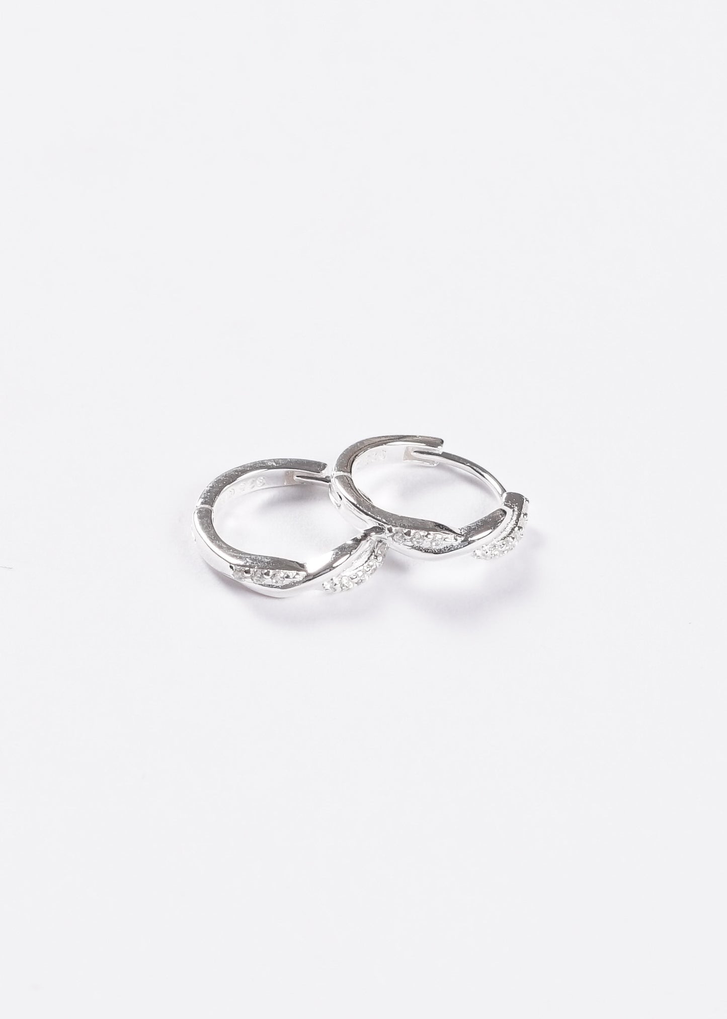 Caravanas aros trenzados zirconias plata 925