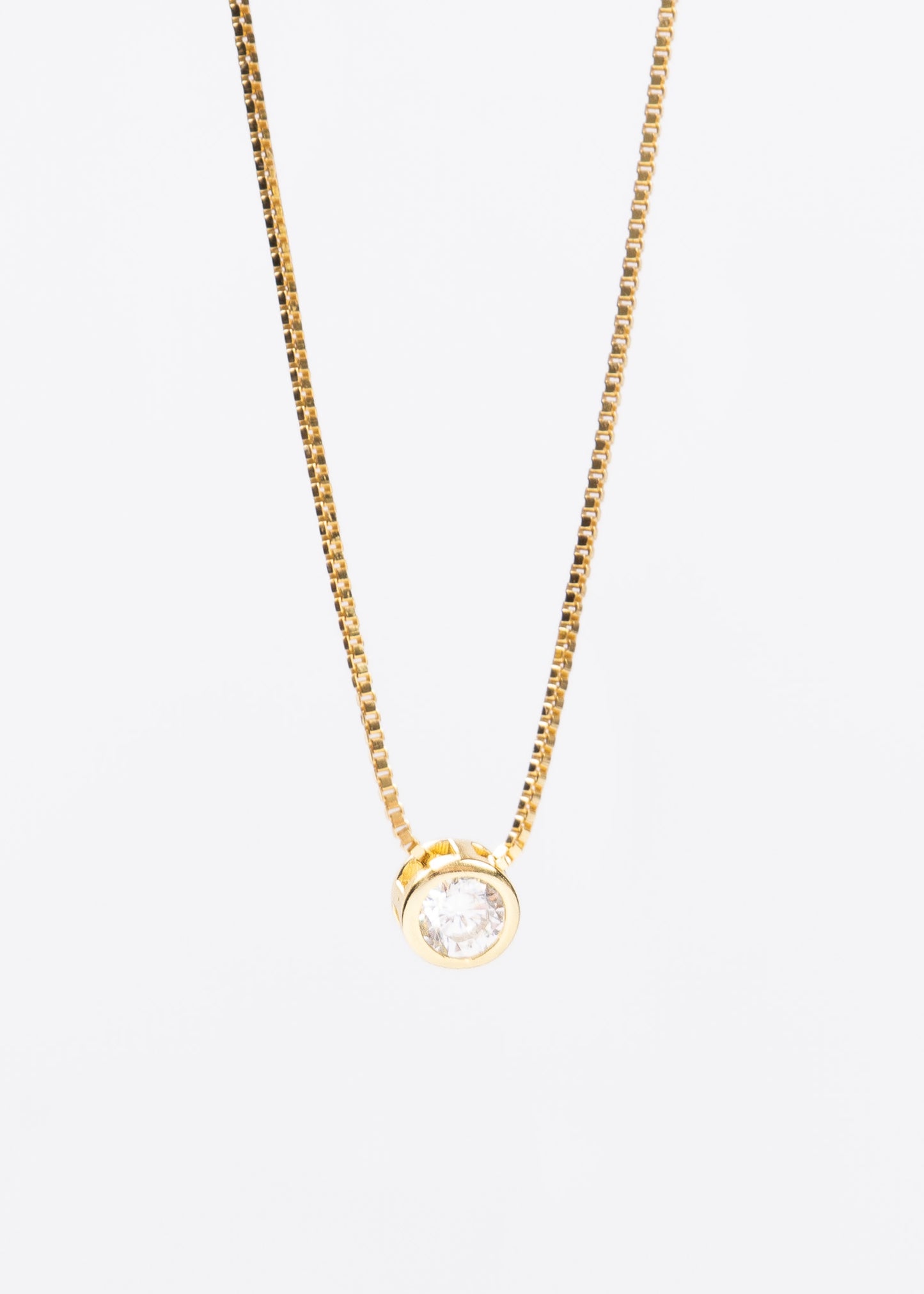 Collar punto luz chico 5mm plata 925 bañado en oro 18k