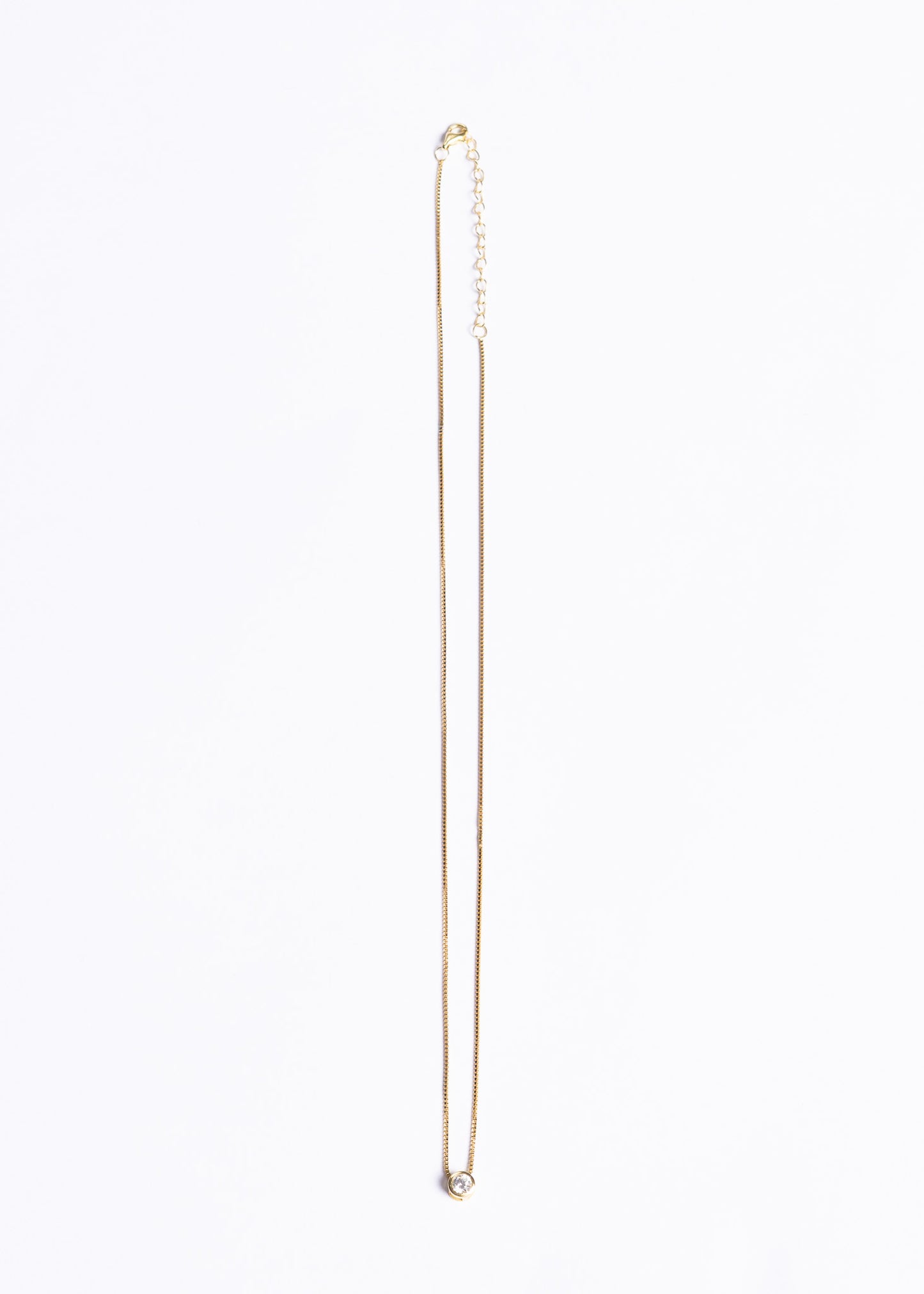 Collar punto luz chico 5mm plata 925 bañado en oro 18k