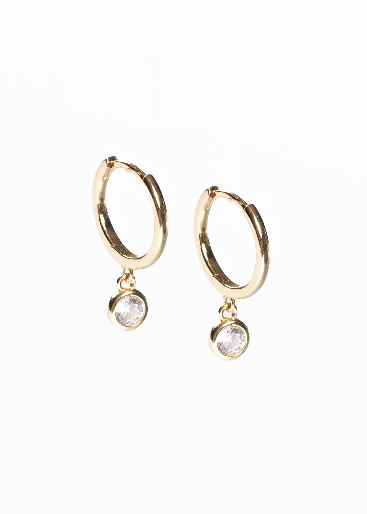 Caravanas aros punto luz plata 925 bañada en oro 18k