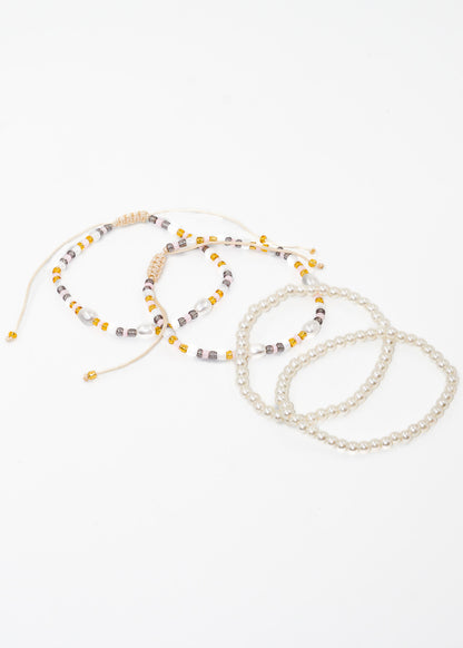 Pulseras ajustables set x4 perlas y mostacillas