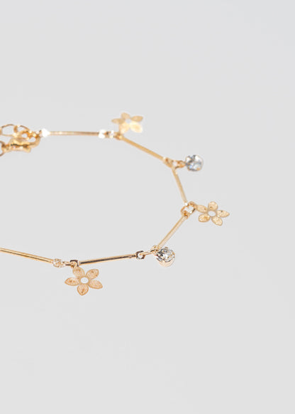 Pulsera barra flores con puntos luz