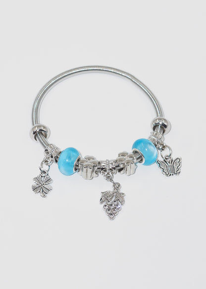 Pulsera elastizada con charms - celeste