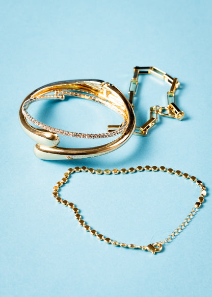 Pulsera brazalete entrelazado - Acero quirúrgico dorado