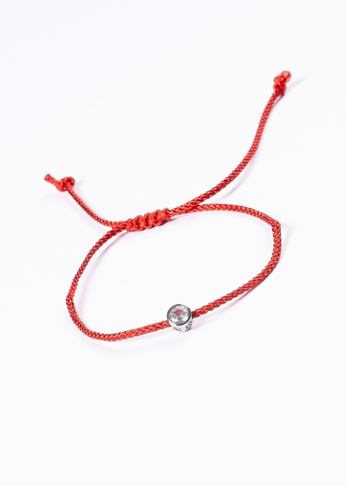 Pulsera hilo rojo con punto luz - Anti envidia ajustable