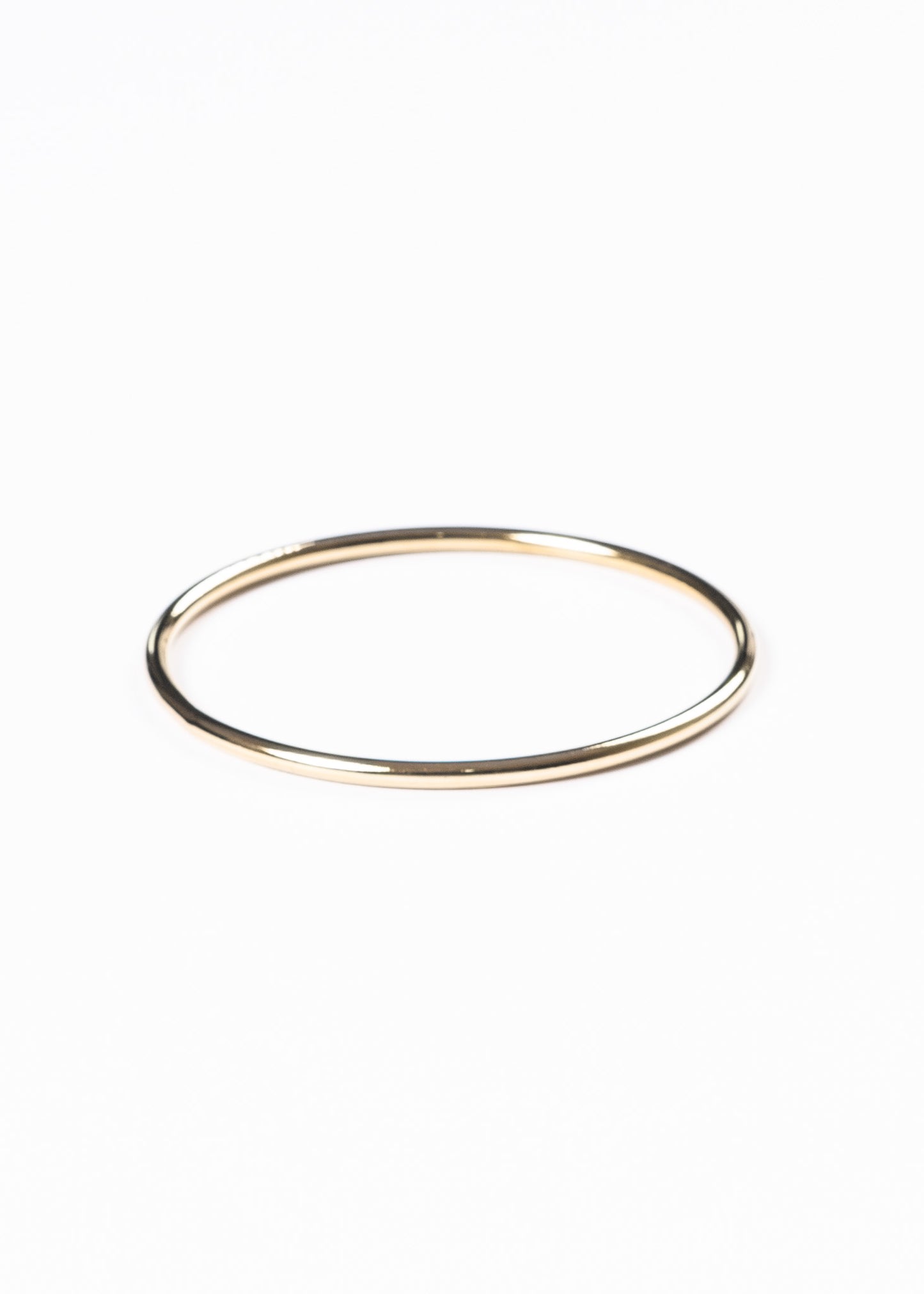 Pulsera esclava caña redonda 3mm - Acero quirúrgico dorado