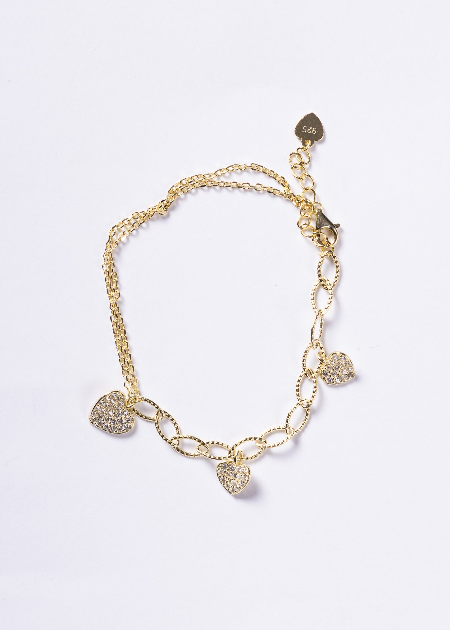 Pulsera combinada con dijes corazones zirconias Plata 925 & Baño en oro 18k