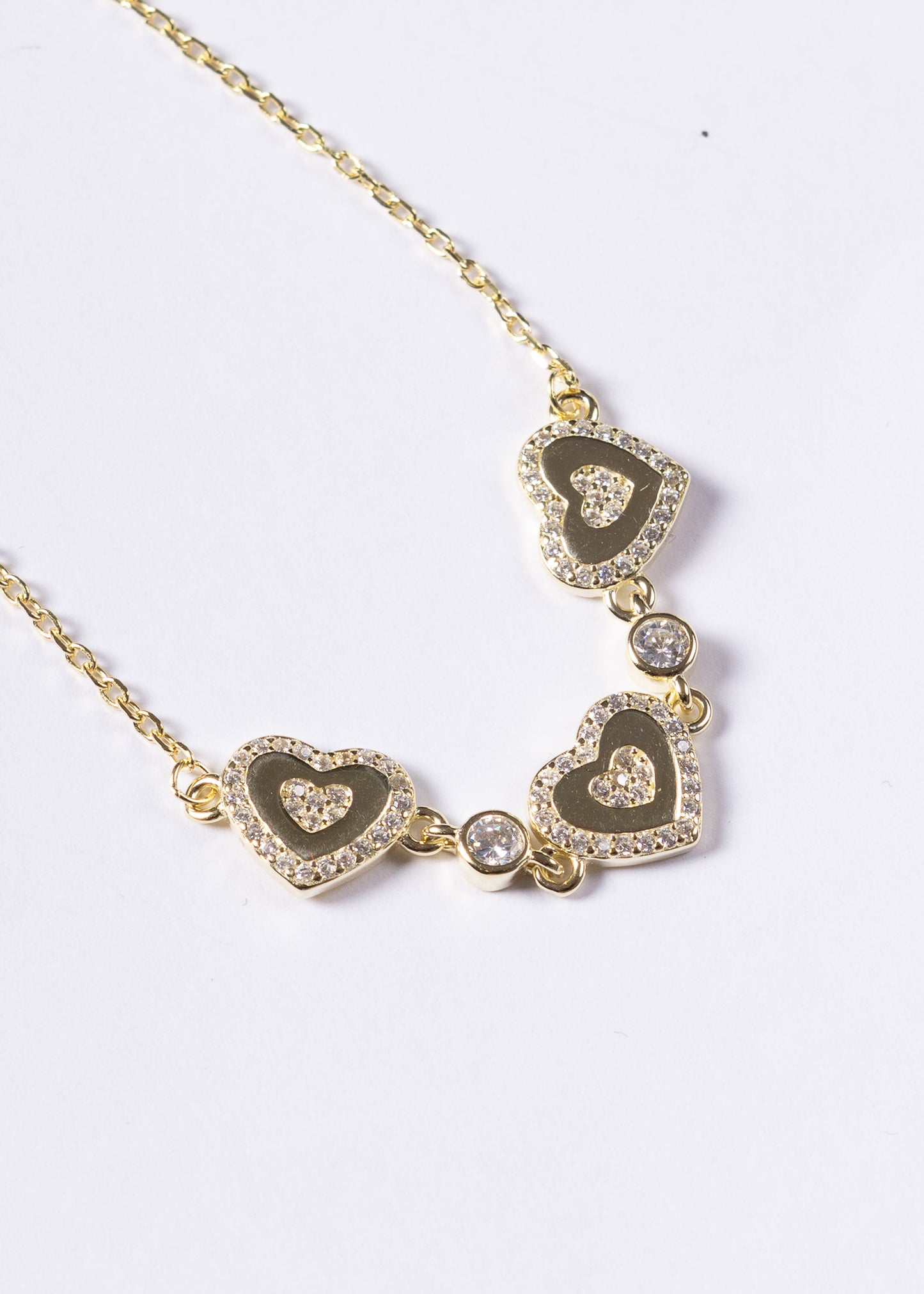 Pulsera forcé tres corazones y puntos luz Plata 925 & Baño en oro 18k