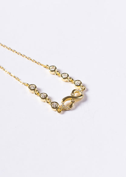 Pulsera infinito mitad zirconias y puntos luz Plata 925 & Baño en oro 18k