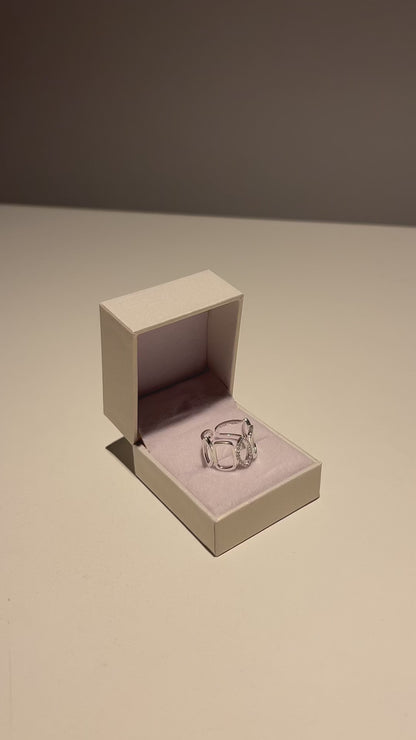 Anillo ajustable marquesas caladas con zirconias plata 925