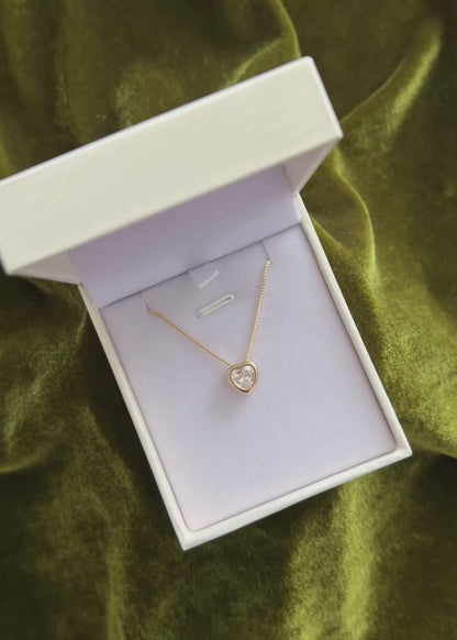 Cadena collar con dije punto luz corazón baño en oro 18k